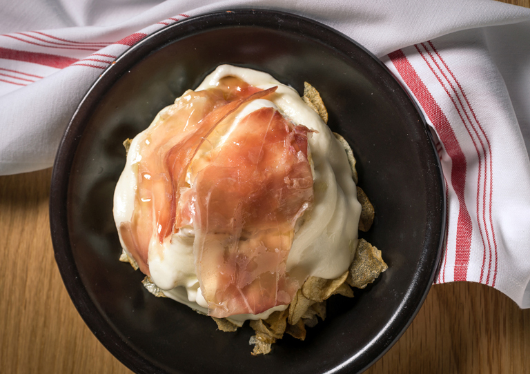 Huevos Bulla are one of my favorite dishes at this Spanish restaurant in Coral Gables. It consists of an organic egg served over homemade potato chips, topped with Serrano ham, potato foam and truffle oil.