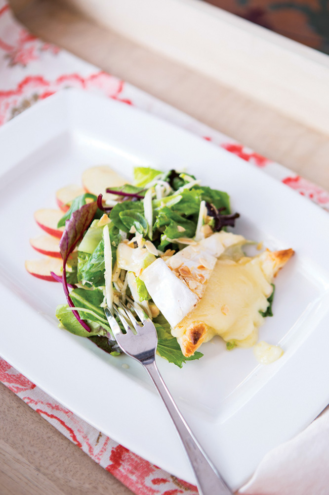 Chef Cindy Hutson Oven Baked Brie Salad at her restaurant Ortanique in Coral Gables, Florida