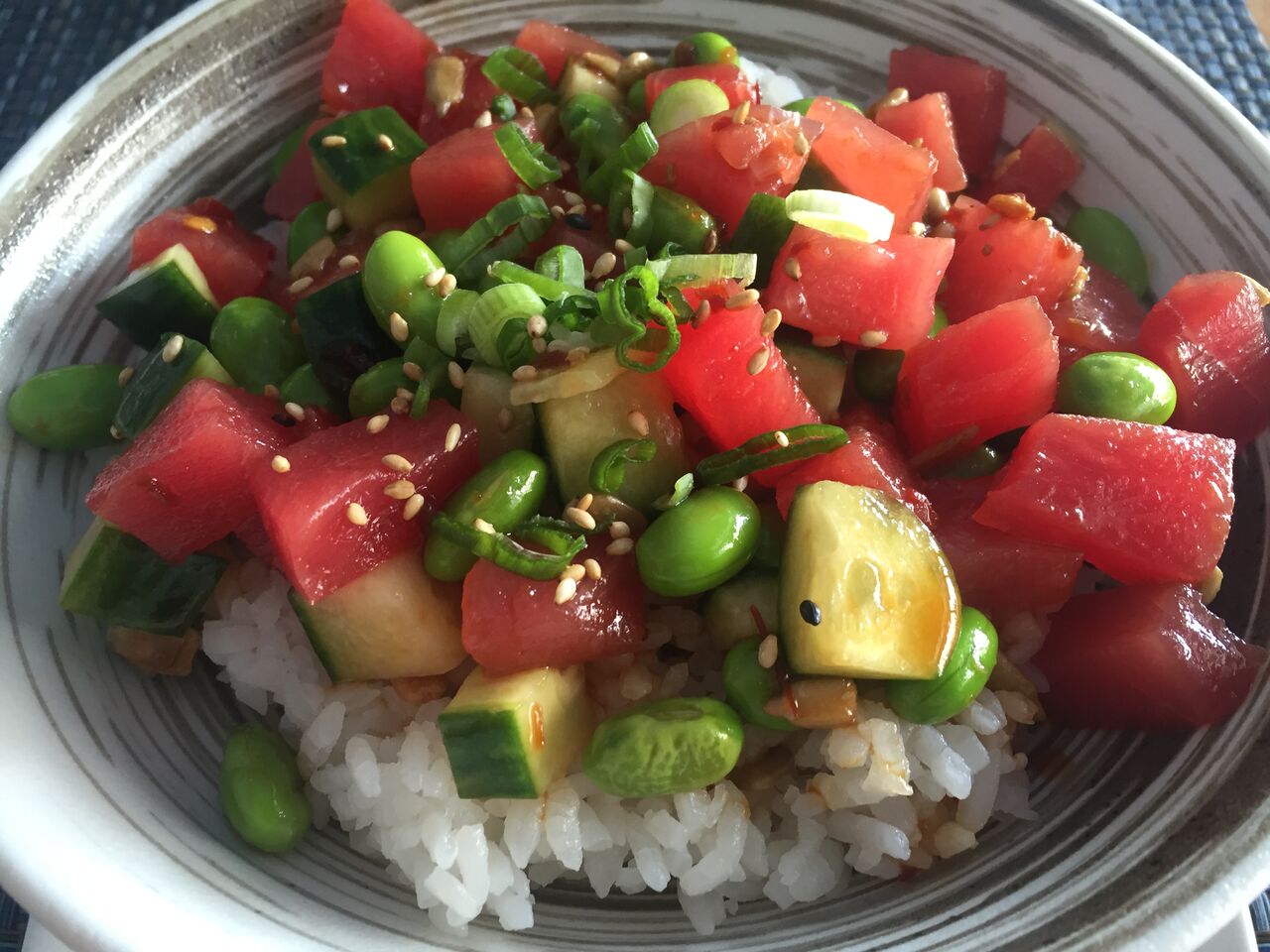 Ahi Poke Bowl with edamame, sunflower seeds, and Hawaiian soy dressing from Sushi Maki in Coral Gables! Click to read more or Pin and save for later.