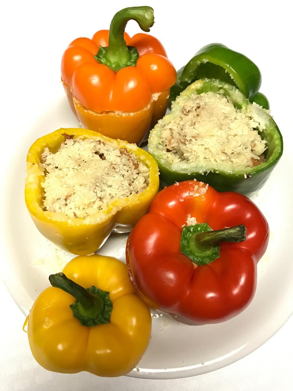 Stuffed Bell Peppers Recipe sprinkled with Parmigiano Reggiano