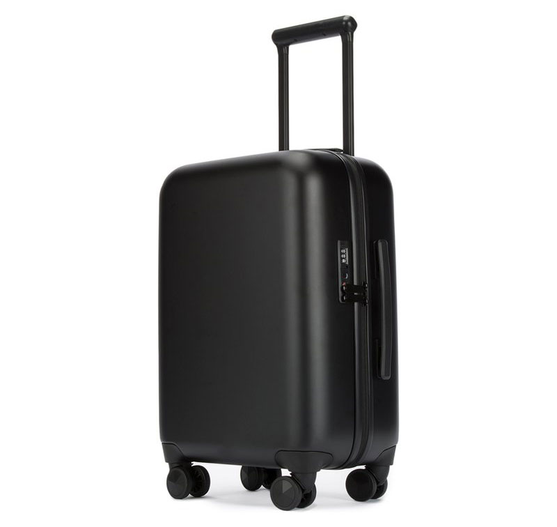 Best Travel Gift Ideas: Rebeca Minkoff suitcase charges your phone or laptop.