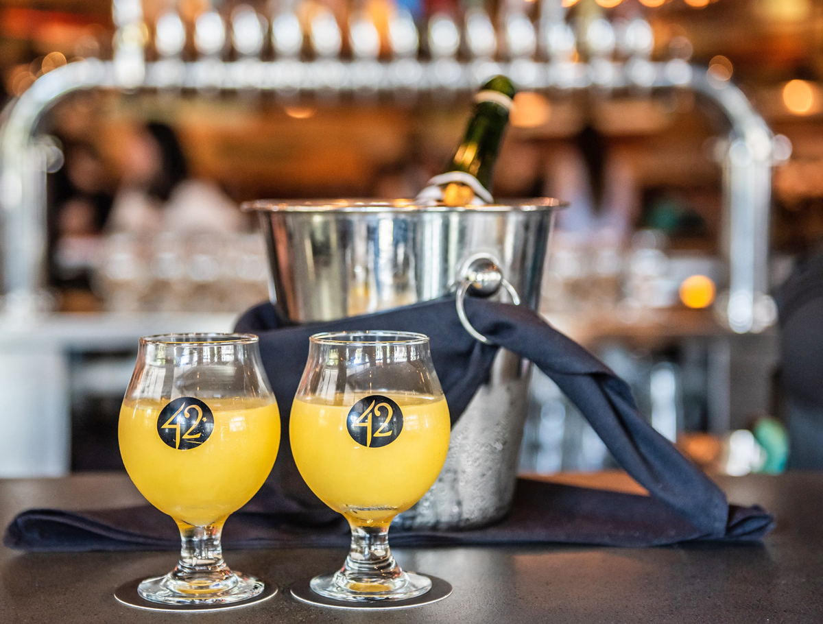 Best Miami Party Brunch Tap 42 in Coral Gables with Bottomless mimosas and a live DJ