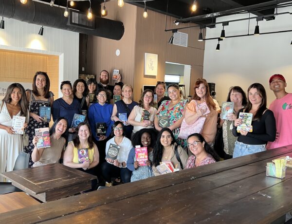 Coral Gables Love REading Party attendee group photo everyone holding a book